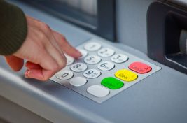 PROD-Cropped-Hand-Of-Man-Using-Atm