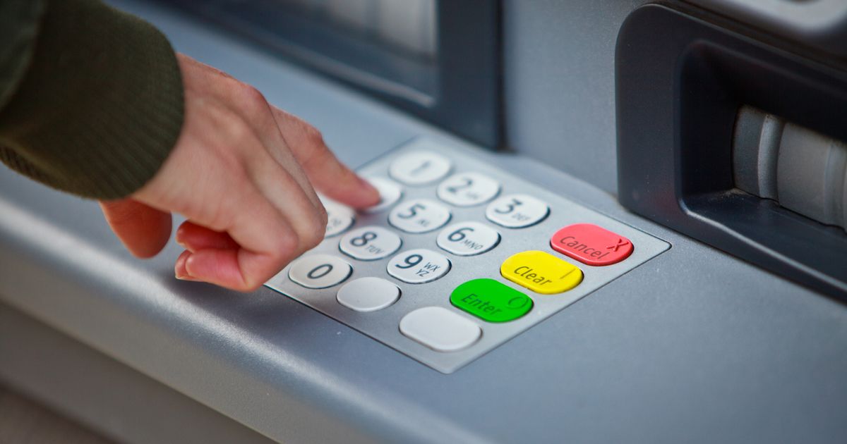 PROD-Cropped-Hand-Of-Man-Using-Atm